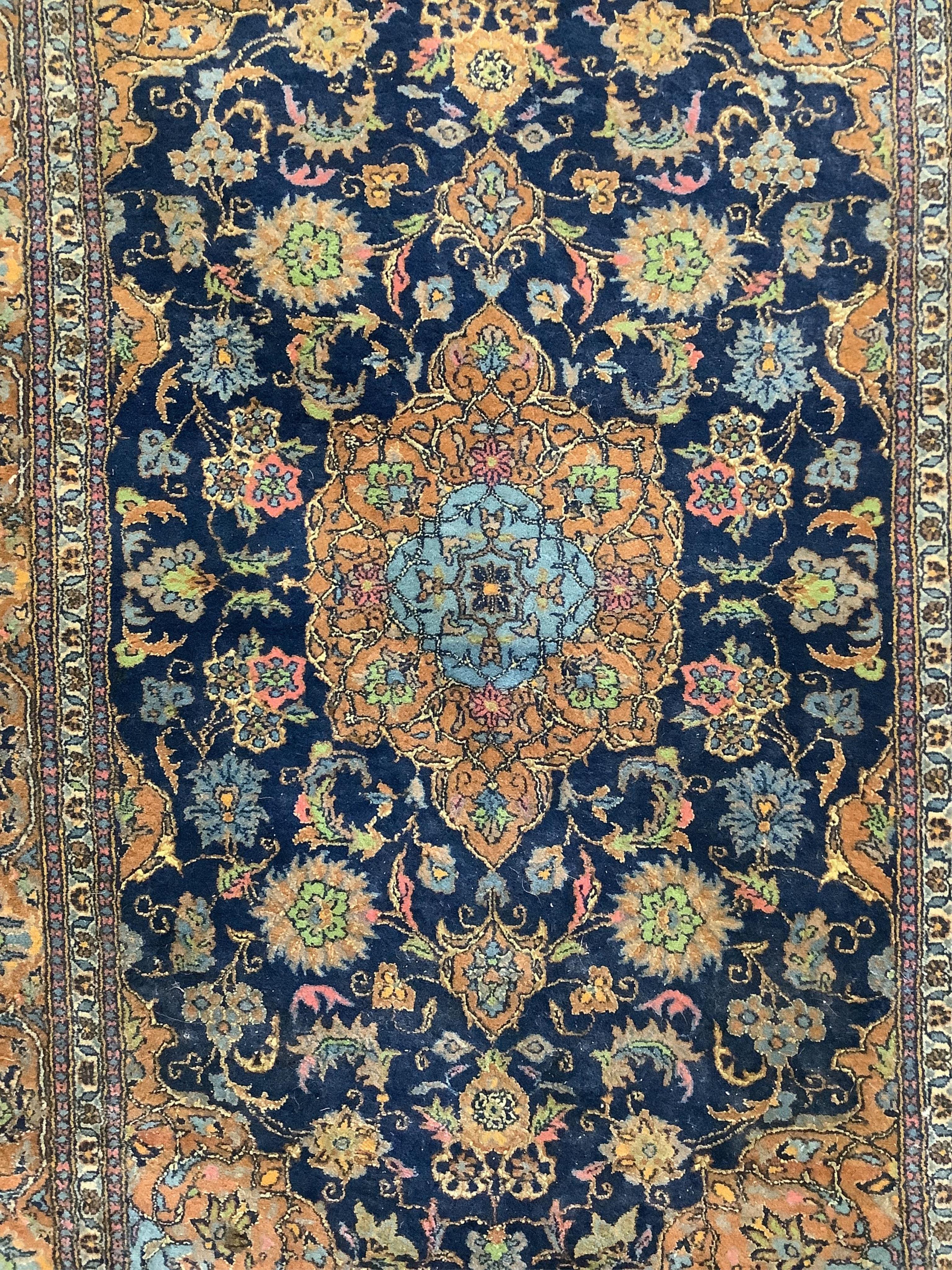 A North West Persian blue ground rug, 184 x 125cm. Condition - fair